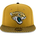 shapka-ploska-zhlt-snapbek-9fifty-sideline-na-jacksonville-jaguars-nfl-ot-new-era