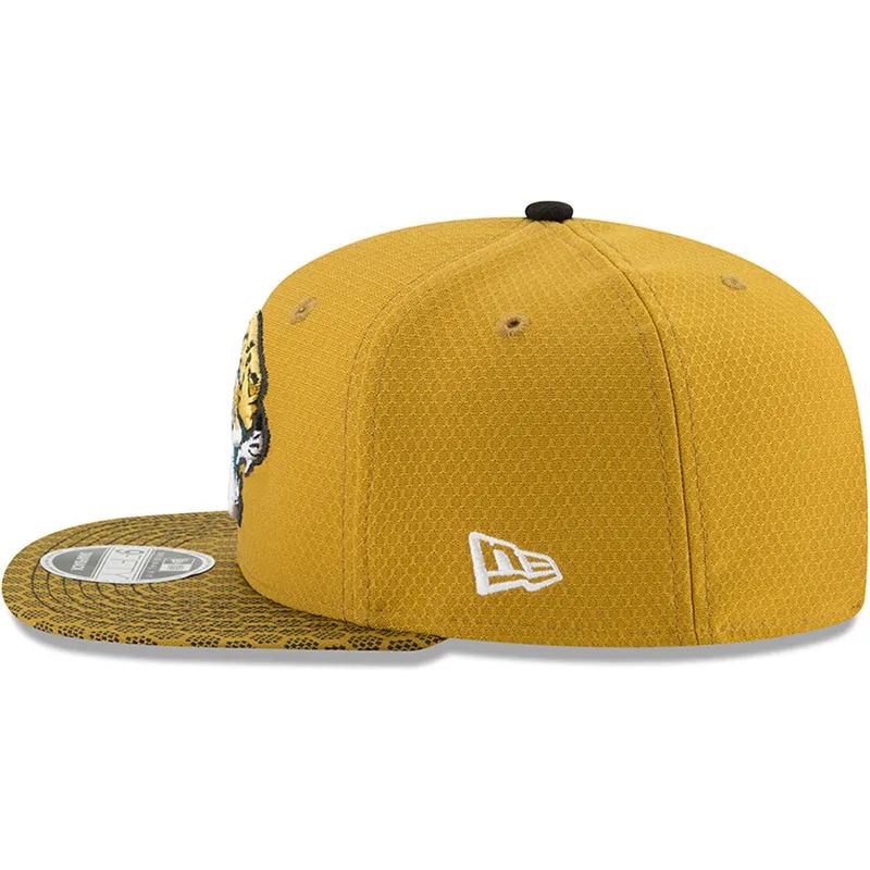 shapka-ploska-zhlt-snapbek-9fifty-sideline-na-jacksonville-jaguars-nfl-ot-new-era