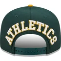 shapka-ploska-zelena-snapbek-9fifty-team-arch-na-oakland-athletics-mlb-ot-new-era