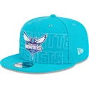 shapka-ploska-sinya-snapbek-9fifty-draft-edition-2023-na-charlotte-hornets-nba-ot-new-era