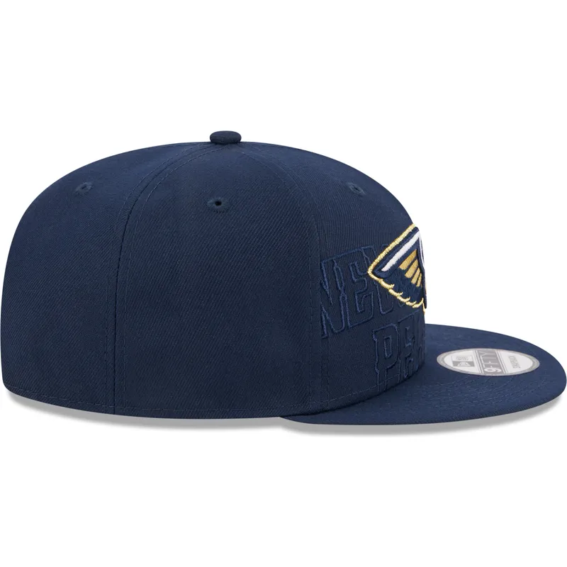 shapka-ploska-tmnosin-snapbek-9fifty-draft-edition-2023-na-new-orleans-pelicans-nba-ot-new-era