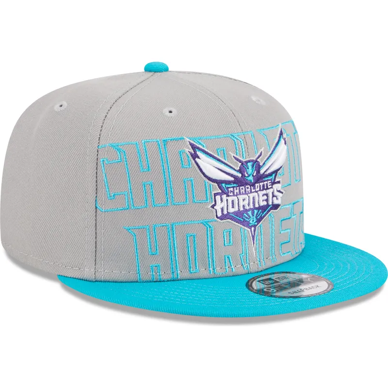 shapka-ploska-siv-snapbek-9fifty-draft-edition-2023-na-charlotte-hornets-nba-ot-new-era