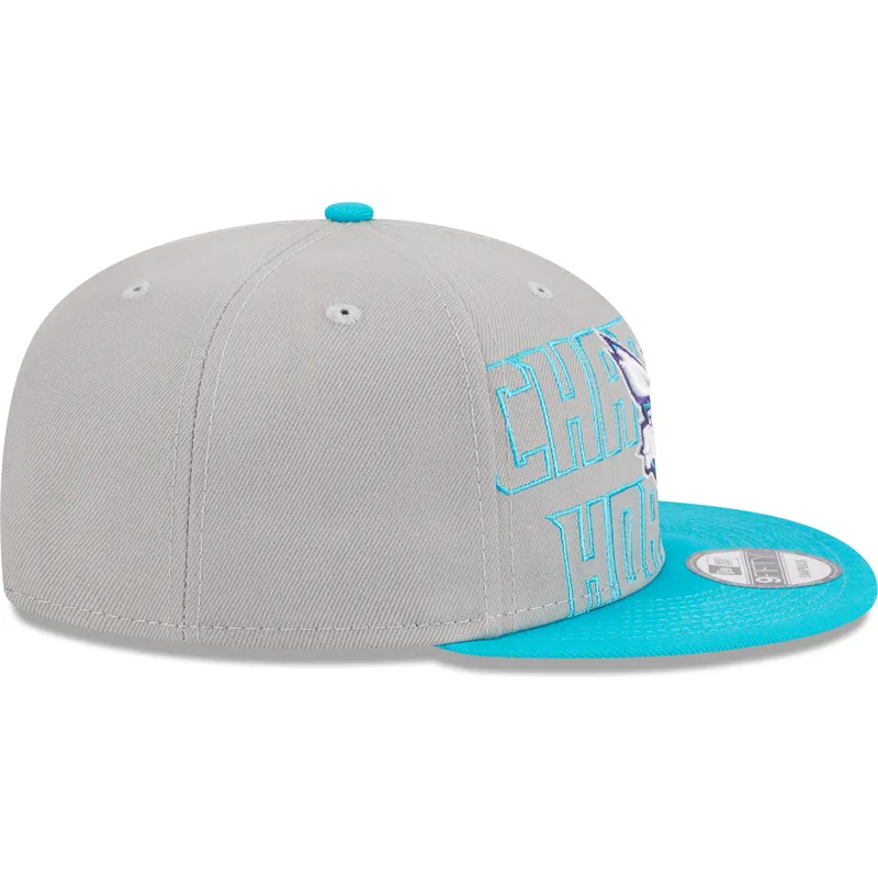 shapka-ploska-siv-snapbek-9fifty-draft-edition-2023-na-charlotte-hornets-nba-ot-new-era