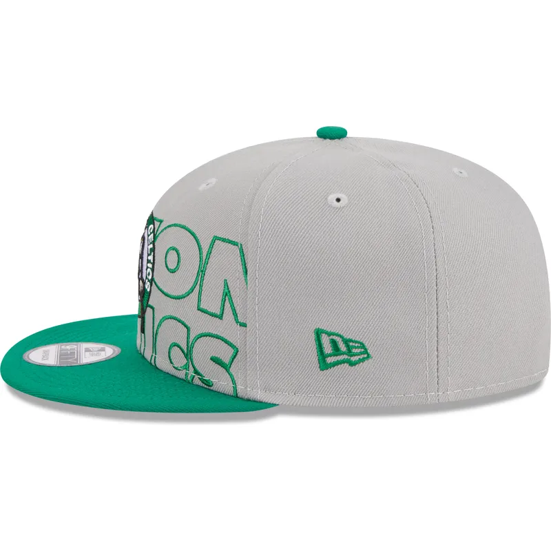 shapka-ploska-siv-snapbek-9fifty-draft-edition-2023-na-boston-celtics-nba-ot-new-era shapka-ploska-siv-snapbek-9fifty-draft-edition-2023-na-boston-celtics-nba-ot-new-era