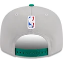 shapka-ploska-siv-snapbek-9fifty-draft-edition-2023-na-boston-celtics-nba-ot-new-era