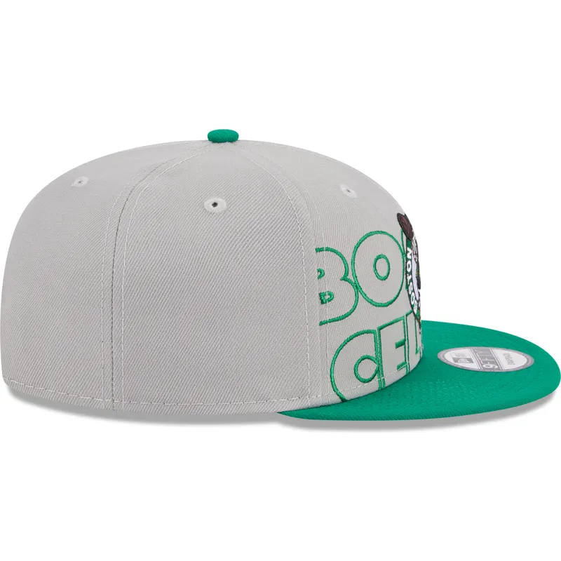 shapka-ploska-siv-snapbek-9fifty-draft-edition-2023-na-boston-celtics-nba-ot-new-era shapka-ploska-siv-snapbek-9fifty-draft-edition-2023-na-boston-celtics-nba-ot-new-era