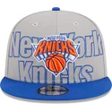 shapka-ploska-siv-snapbek-9fifty-draft-edition-2023-na-new-york-knicks-nba-ot-new-era