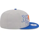 shapka-ploska-siv-snapbek-9fifty-draft-edition-2023-na-new-york-knicks-nba-ot-new-era