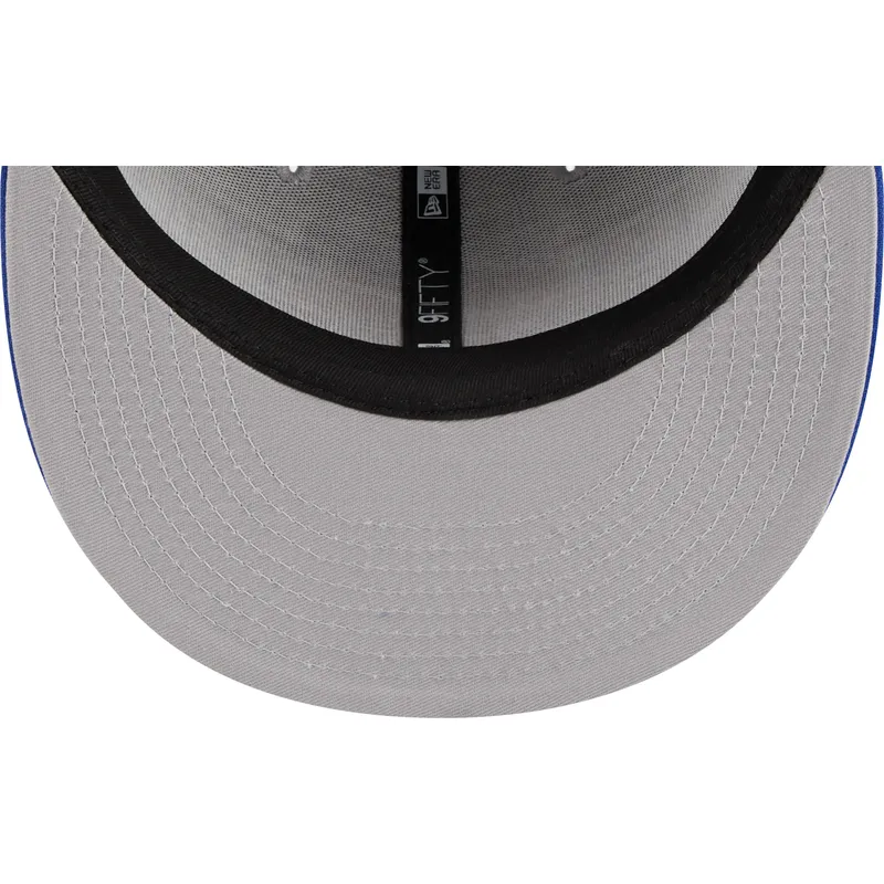 graue-und-blaue-flatcap-snapback-9fifty-draft-edition-2023-der-new-york-knicks-nba-von-new-era