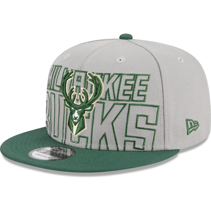 shapka-ploska-siv-snapbek-9fifty-draft-edition-2023-na-milwaukee-bucks-nba-ot-new-era