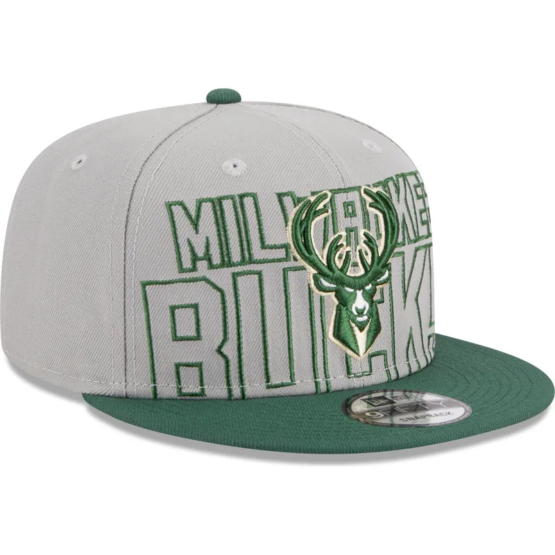 shapka-ploska-siv-snapbek-9fifty-draft-edition-2023-na-milwaukee-bucks-nba-ot-new-era