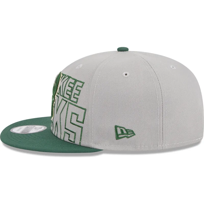 shapka-ploska-siv-snapbek-9fifty-draft-edition-2023-na-milwaukee-bucks-nba-ot-new-era