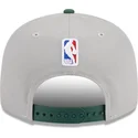 shapka-ploska-siv-snapbek-9fifty-draft-edition-2023-na-milwaukee-bucks-nba-ot-new-era
