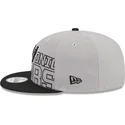 shapka-ploska-siv-snapbek-9fifty-draft-edition-2023-na-san-antonio-spurs-nba-ot-new-era