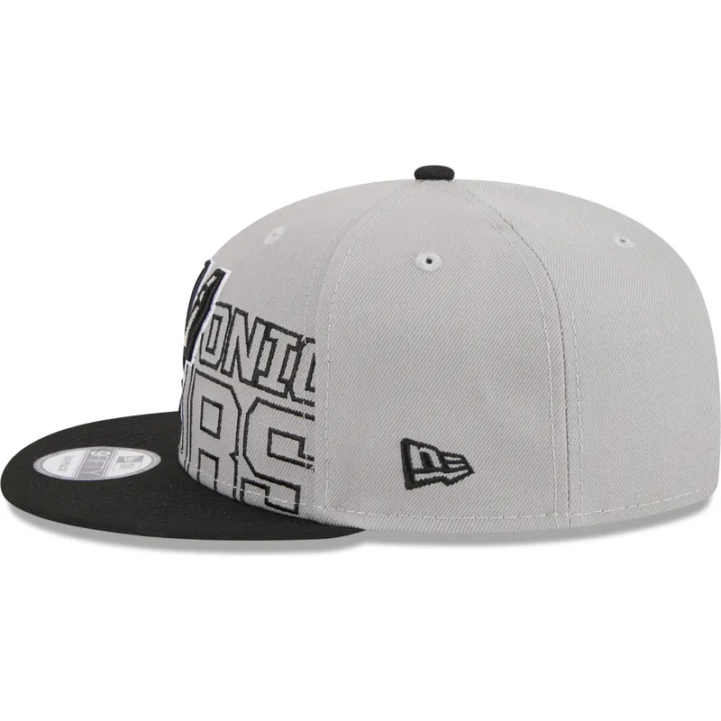 shapka-ploska-siv-snapbek-9fifty-draft-edition-2023-na-san-antonio-spurs-nba-ot-new-era shapka-ploska-siv-snapbek-9fifty-draft-edition-2023-na-san-antonio-spurs-nba-ot-new-era