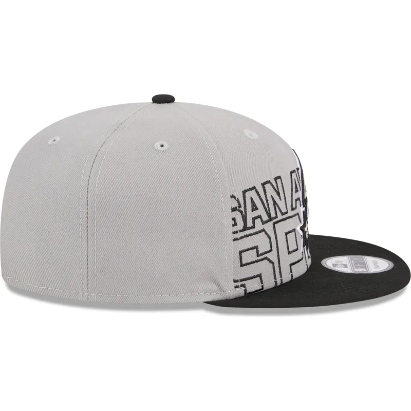 shapka-ploska-siv-snapbek-9fifty-draft-edition-2023-na-san-antonio-spurs-nba-ot-new-era shapka-ploska-siv-snapbek-9fifty-draft-edition-2023-na-san-antonio-spurs-nba-ot-new-era