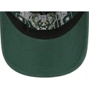 grune-verstellbare-curved-cap-9twenty-draft-edition-2023-der-milwaukee-bucks-nba-von-new-era