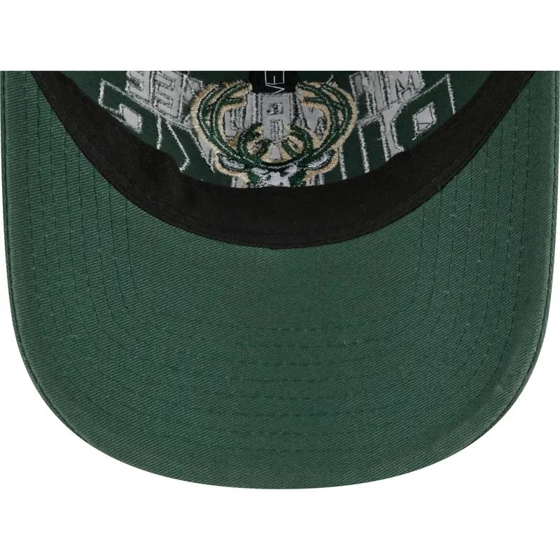 grune-verstellbare-curved-cap-9twenty-draft-edition-2023-der-milwaukee-bucks-nba-von-new-era