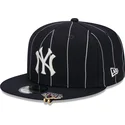 shapka-ploska-tmnosin-snapbek-9fifty-pinstripe-visor-clip-na-new-york-yankees-mlb-ot-new-era