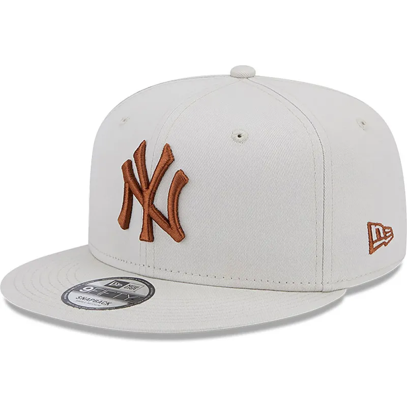 shapka-ploska-bezhov-snapbek-9fifty-league-essential-na-new-york-yankees-mlb-ot-new-era