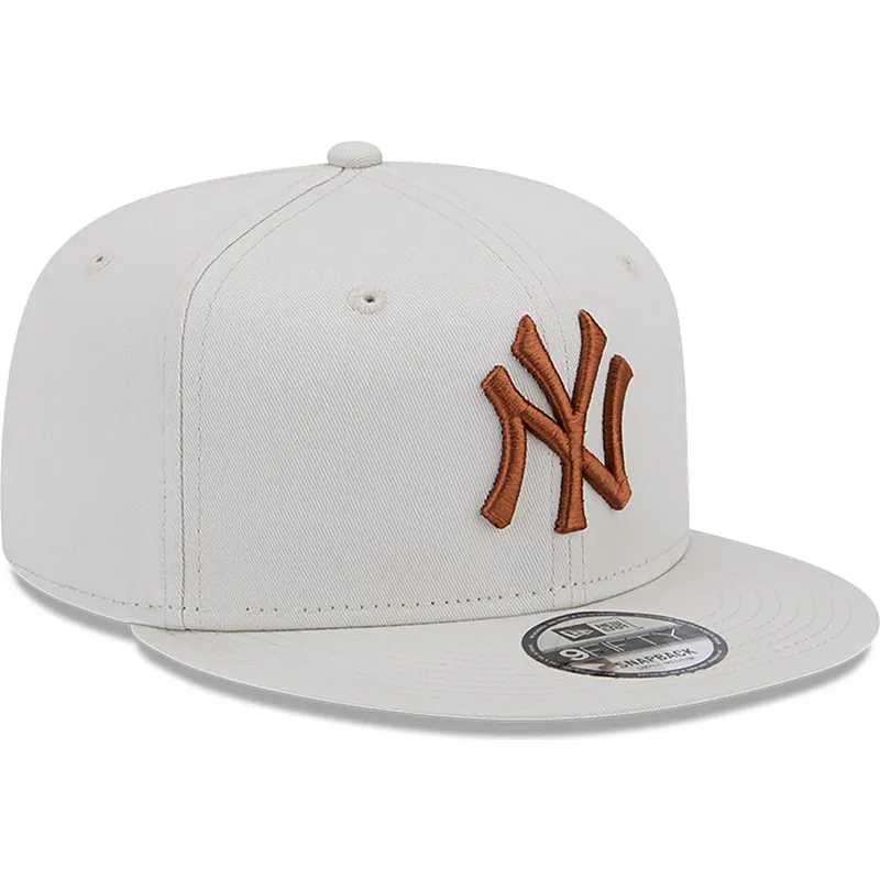 shapka-ploska-bezhov-snapbek-9fifty-league-essential-na-new-york-yankees-mlb-ot-new-era