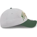 shapka-izvita-siv-reguliruema-9twenty-tip-off-2023-na-milwaukee-bucks-nba-ot-new-era