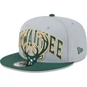 shapka-ploska-siv-snapbek-9fifty-tip-off-2023-na-milwaukee-bucks-nba-ot-new-era