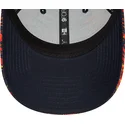shapka-izvita-chervena-reguliruem-9forty-all-over-print-na-red-bull-racing-formula-1-ot-new-era
