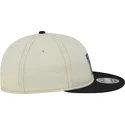 shapka-ploska-bezhov-reguliruem-9fifty-retro-crown-denim-na-oakland-raiders-nfl-ot-new-era
