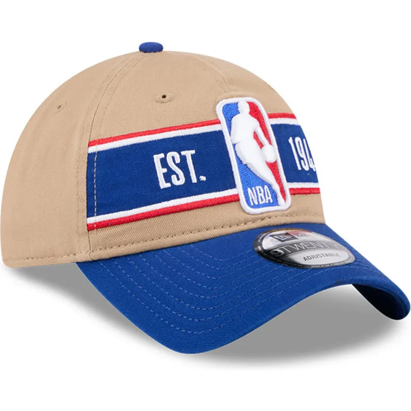 brun-og-bla-justerbar-kurvet-kasket-9twenty-draft-2024-fra-nba-fra-new-era
