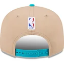 braune-und-blaue-flatcap-snapback-9fifty-draft-2024-der-charlotte-hornets-nba-von-new-era