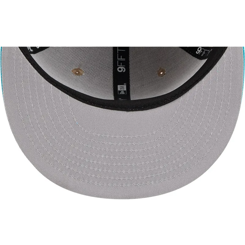 braune-und-blaue-flatcap-snapback-9fifty-draft-2024-der-charlotte-hornets-nba-von-new-era