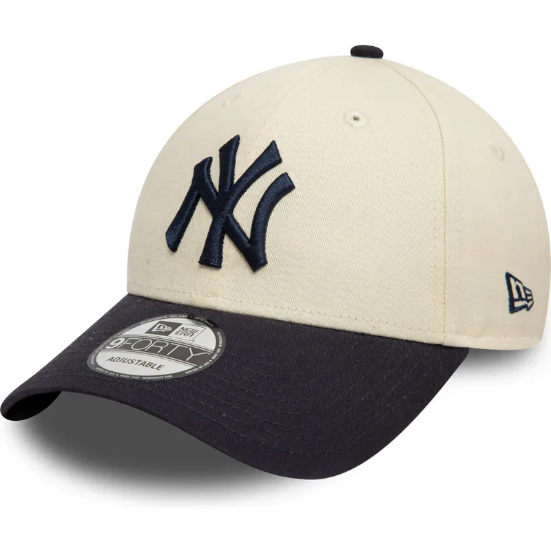 justerbar-9forty-colour-block-beige-og-marinebla-buet-kasket-fra-new-york-yankees-mlb-fra-new-era