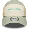 new-era-curved-brim-runner-tech-beige-and-green-adjustable-cap