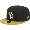schwarze-und-gelbe-anliegende-flatcap-mit-goldenem-logo-59fifty-day-von-new-york-yankees-mlb-von-new-era