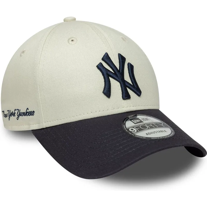 justerbar-9forty-side-script-beige-og-marinebla-buet-kasket-fra-new-york-yankees-mlb-fra-new-era