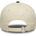 verstellbare-beige-und-marineblaue-9twenty-damenkappe-mit-gebogenem-schirm-von-new-era