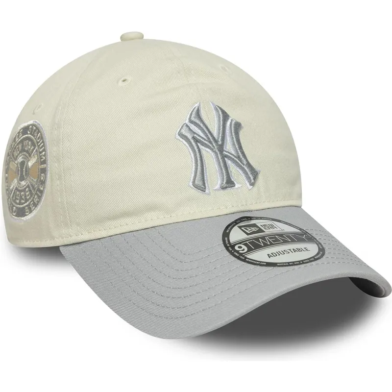 new-era-izvita-kozirka-damska-9twenty-world-series-cooperstown-new-york-yankees-mlb-bezhova-i-siva-reguliruema-shapka
