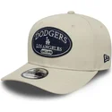 shapka-izvita-bezhov-snapbek-9seventy-stretch-snap-patch-na-los-angeles-dodgers-mlb-ot-new-era