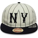 beige-og-marinebla-justerbar-9fifty-retro-crown-heritage-kasket-fra-new-york-yankees-mlb-fra-new-era