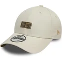new-era-curved-brim-9forty-badge-beige-adjustable-cap