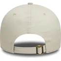 new-era-curved-brim-9forty-badge-beige-adjustable-cap