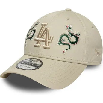 Beige verstellbare Kappe mit gebogenem Schirm und beigem Logo 9FORTY Icon Dragon der Los Angeles Dodgers MLB von New Era