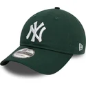 new-era-curved-brim-9twenty-league-essential-new-york-yankees-mlb-dark-green-adjustable-cap