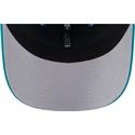 casquette-trucker-bleue-9seventy-stretch-snap-evergreen-helmet-miami-dolphins-nfl-new-era