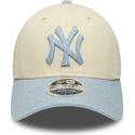 new-era-curved-brim-blue-logo-9forty-m-crown-side-script-new-york-yankees-mlb-beige-and-blue-snapback-cap