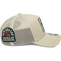 shapka-izvita-traker-bezhov-snapbek-9forty-m-crown-a-frame-multi-patch-ot-new-era